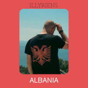 Klient me maicën e zezë me shqiponjë, me shpinë nga deti